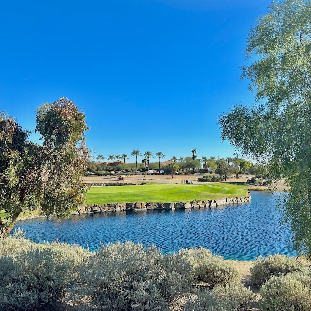 Panoramic view of a lush green golf course at Cimarron Golf Course. Smooth