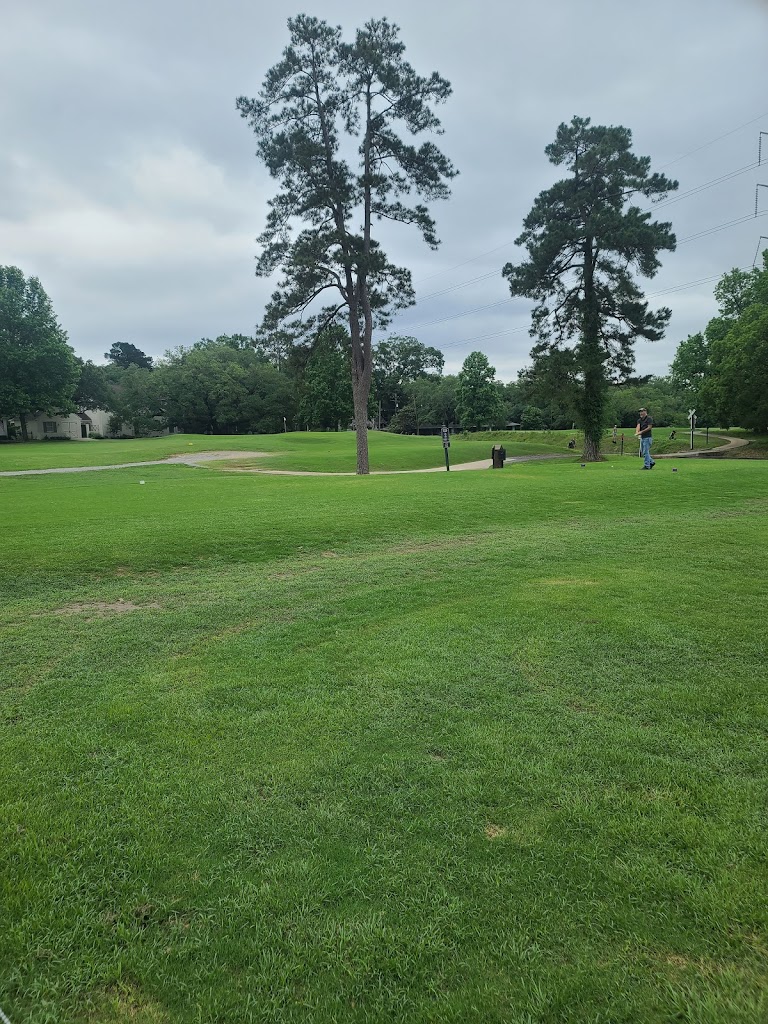 Panoramic view of a lush green golf course at City Park Golf Course. Smooth