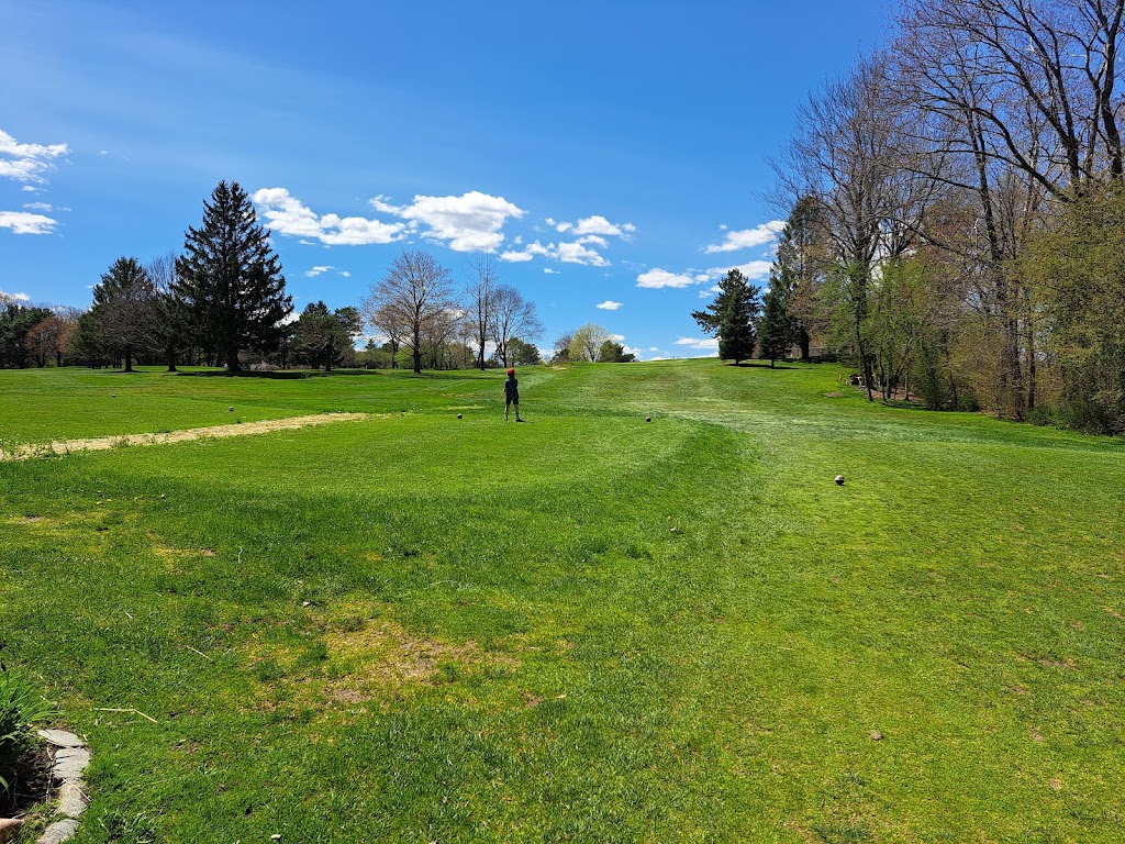 Panoramic view of a lush green golf course at City of South Portland: Municipal Golf Course. Smooth