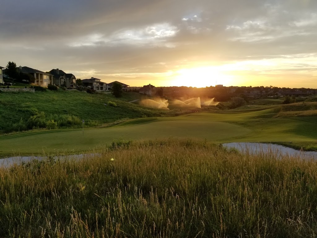 Panoramic view of a lush green golf course at Colbert Hills Golf Course. Smooth