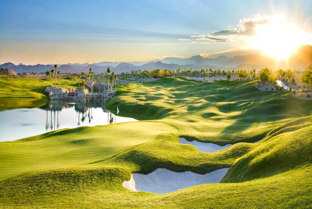 Panoramic view of a lush green golf course at Coyote Springs Golf Club. Smooth