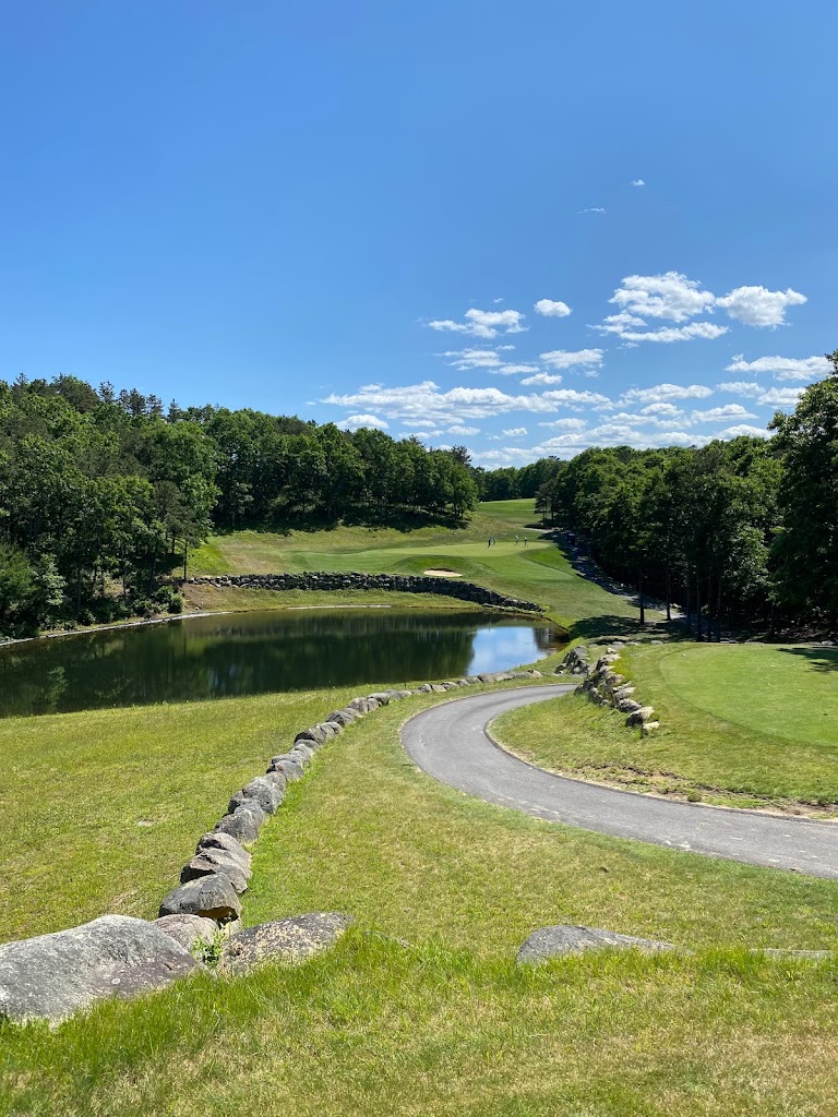 Panoramic view of a lush green golf course at Crosswinds Golf Club. Smooth