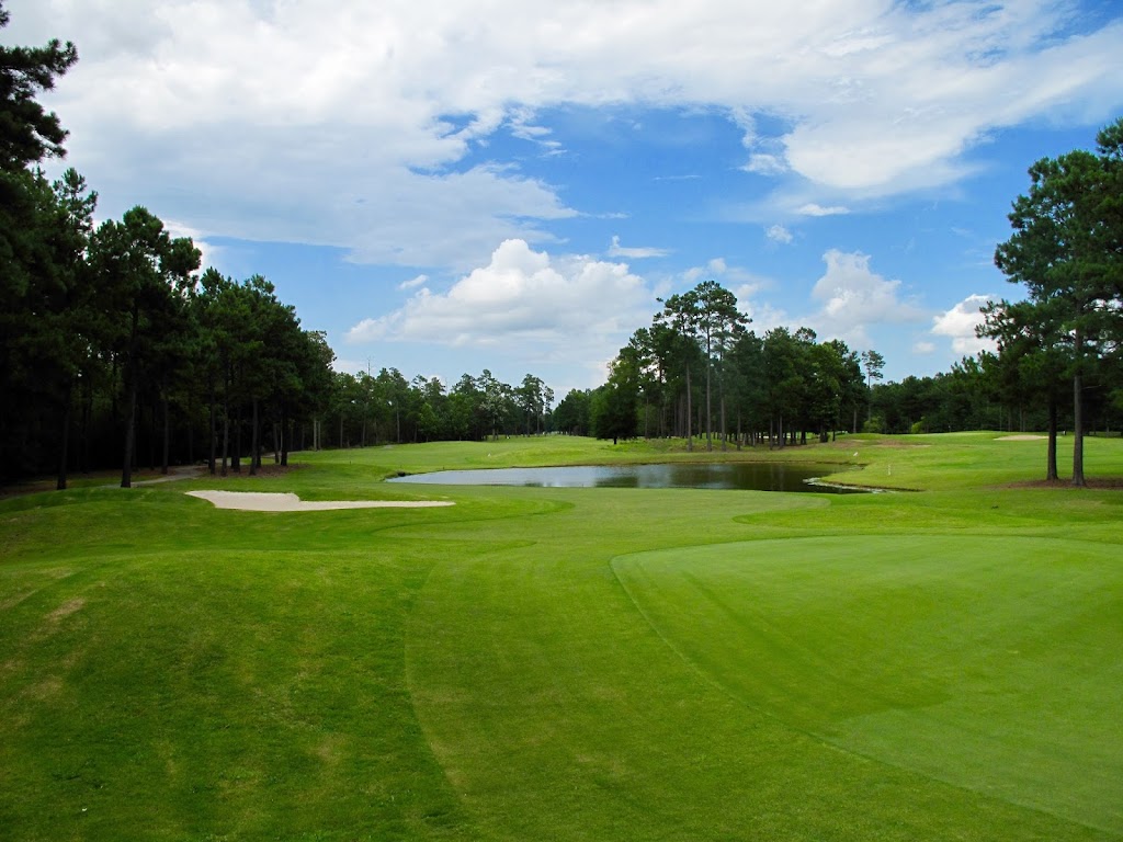 Panoramic view of a lush green golf course at Crown Park Golf Club. Smooth