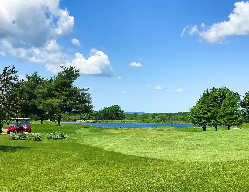 Panoramic view of a lush green golf course at Crown Pointe Golf Club. Smooth