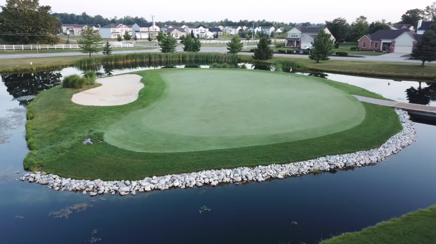 Panoramic view of a lush green golf course at Cumberland Trail Golf Club. Smooth