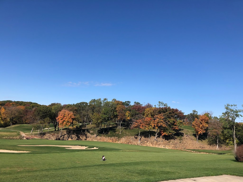 Panoramic view of a lush green golf course at Davenport Country Club. Smooth