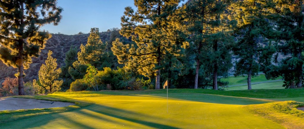 Panoramic view of a lush green golf course at DeBell Golf Club. Smooth