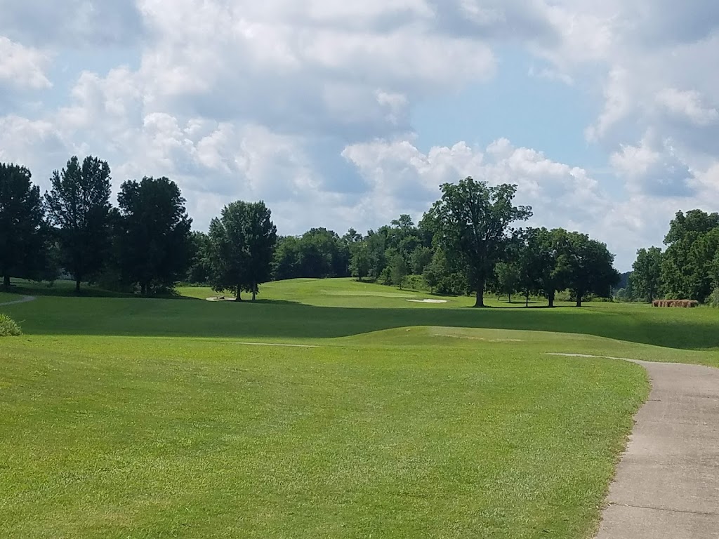 Panoramic view of a lush green golf course at Deer Lakes Golf Course. Smooth