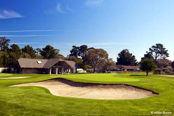 Panoramic view of a lush green golf course at Del Monte Golf Course. Smooth