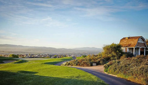 Panoramic view of a lush green golf course at Dublin Ranch Golf Course. Smooth