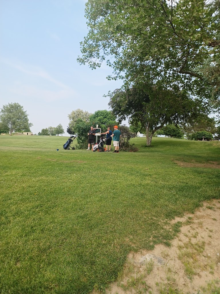 Panoramic view of a lush green golf course at Echo City Golf Course. Smooth