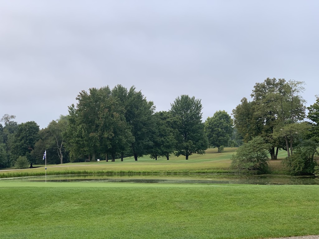 Panoramic view of a lush green golf course at Echo Hills Golf Club. Smooth