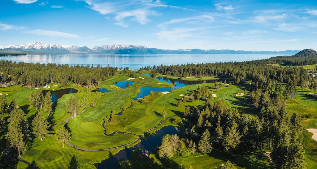 Panoramic view of a lush green golf course at Edgewood Tahoe Golf Course. Smooth