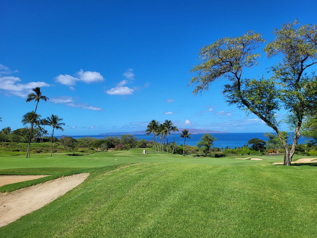 Panoramic view of a lush green golf course at Emerald Golf Course. Smooth