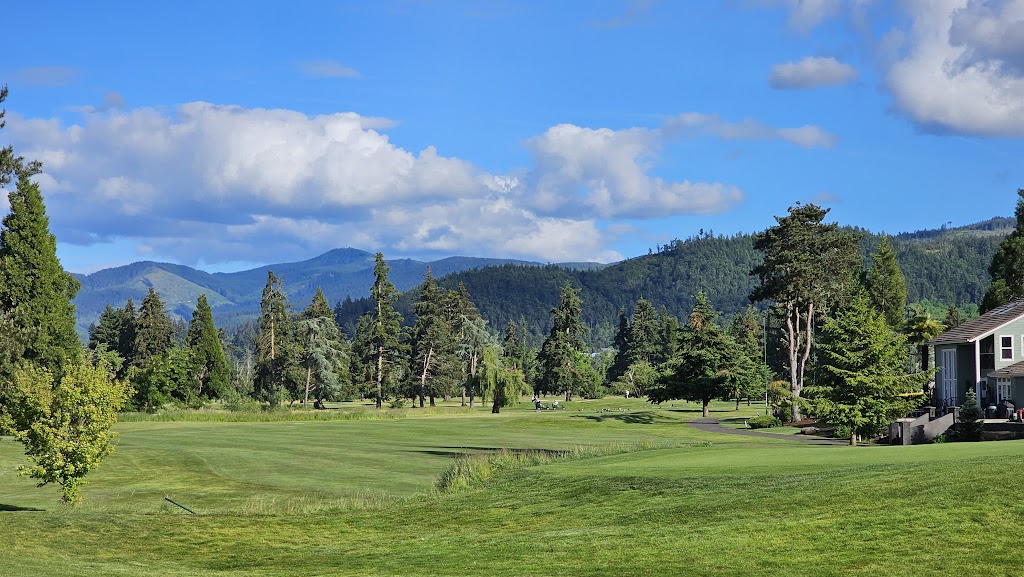 Panoramic view of a lush green golf course at Emerald Valley Golf Club. Smooth