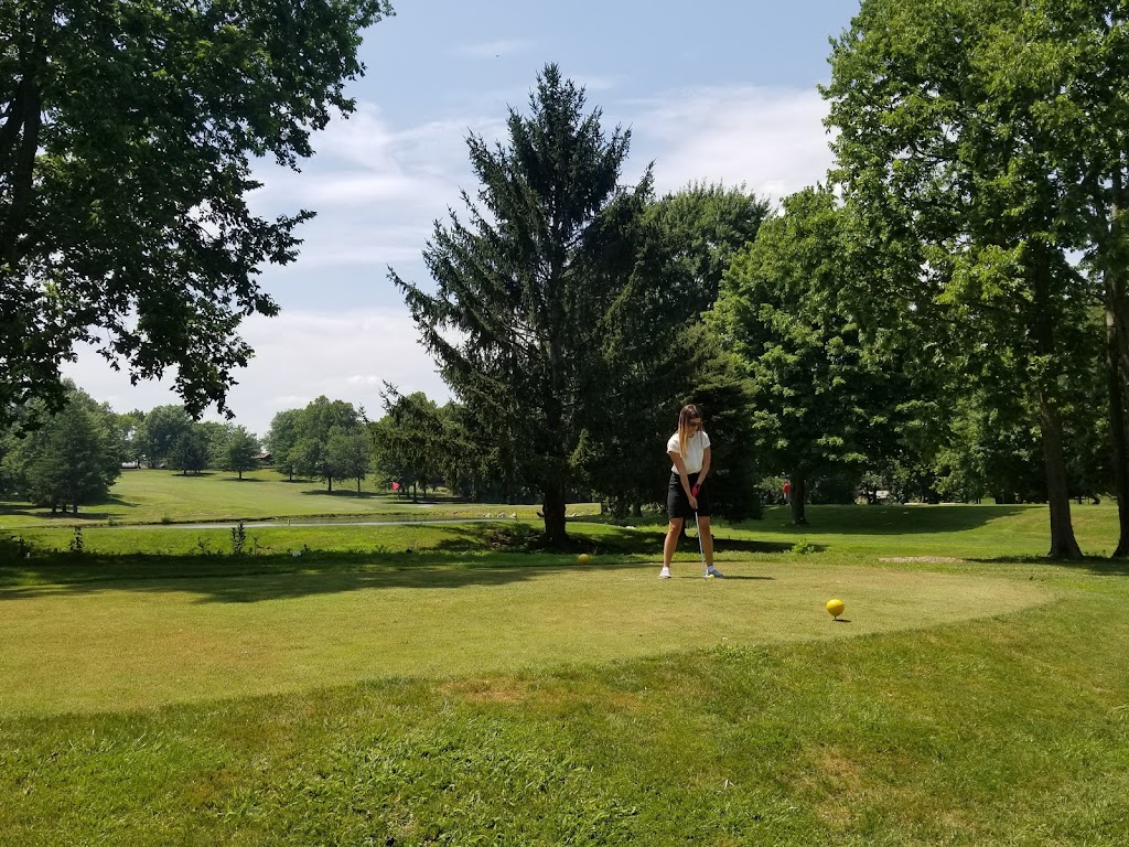 Panoramic view of a lush green golf course at Fairfield South Trace Golf Course. Smooth