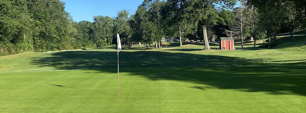 Panoramic view of a lush green golf course at Fairlawn Golf Course. Smooth