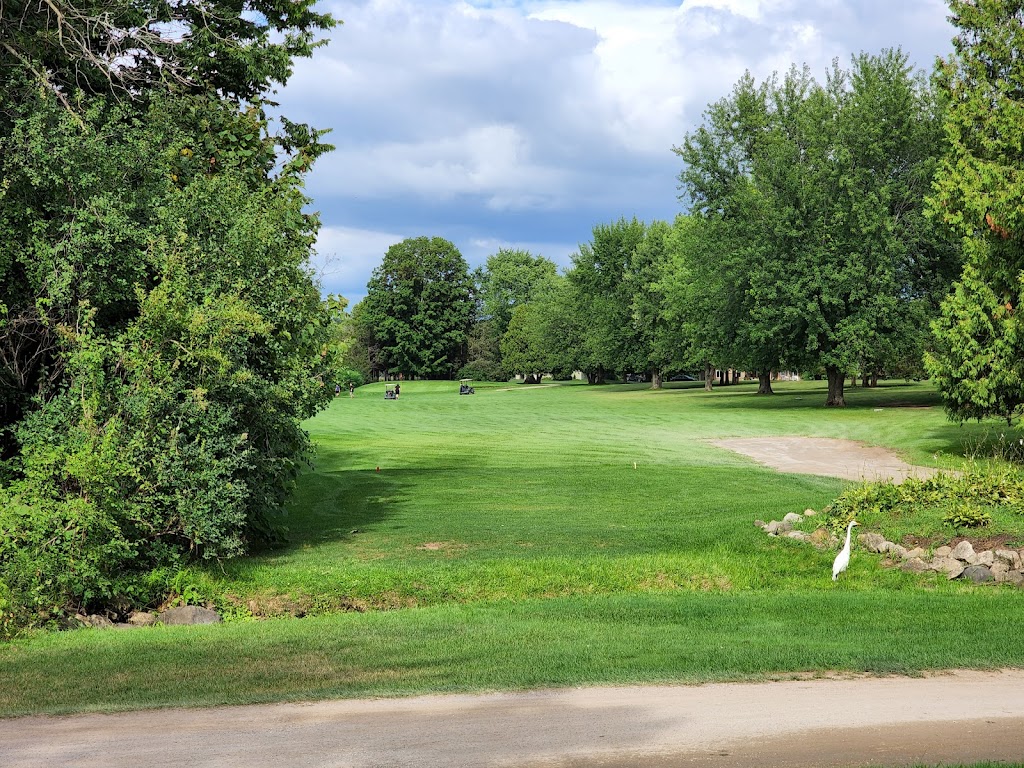 Panoramic view of a lush green golf course at Far Vu Golf Course. Smooth