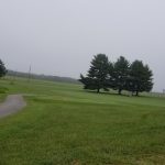 Panoramic view of a lush green golf course at Farmville Municipal Golf Course. Smooth