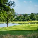 Panoramic view of a lush green golf course at Finkbine Golf Course. Smooth