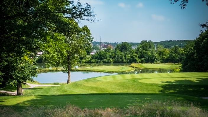 Panoramic view of a lush green golf course at Finkbine Golf Course. Smooth