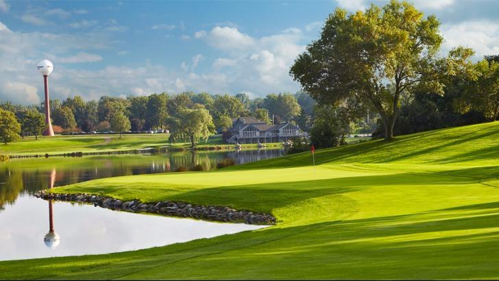 Panoramic view of a lush green golf course at Firestone Country Club. Smooth