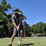 green grass with the flag in the hole.