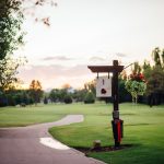 Panoramic view of a lush green golf course at Fort Collins Country Club. Smooth