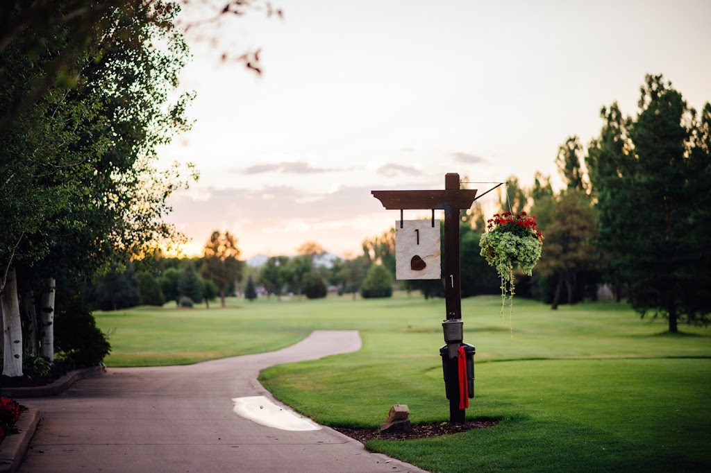 Panoramic view of a lush green golf course at Fort Collins Country Club. Smooth