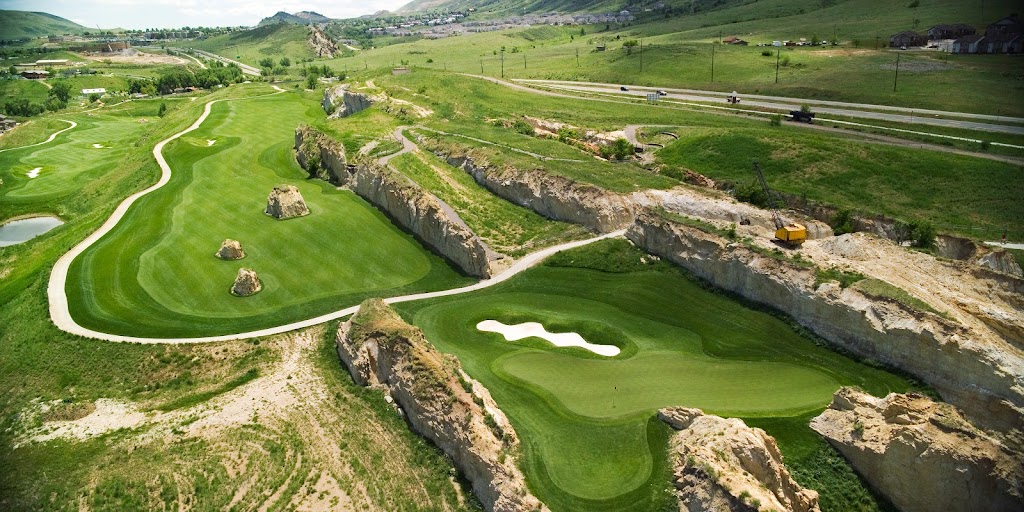 Panoramic view of a lush green golf course at Fossil Trace Golf Club. Smooth