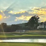 Panoramic view of a lush green golf course at Fox Hopyard Golf Club. Smooth