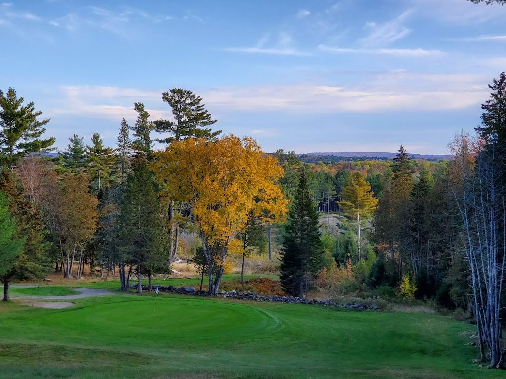 Panoramic view of a lush green golf course at Foxcroft Golf Club. Smooth