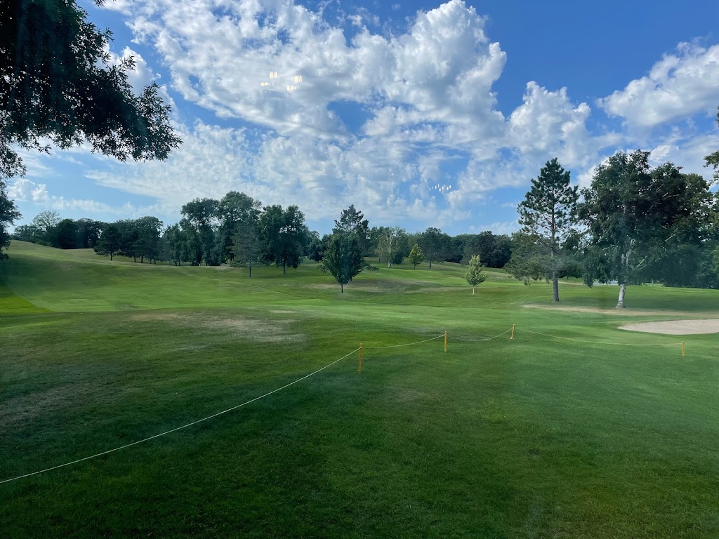 Panoramic view of a lush green golf course at Frazee Golf Course. Smooth