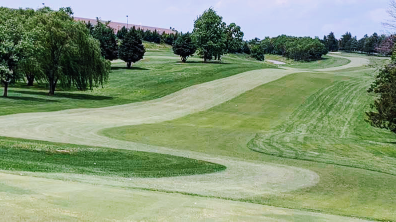 Panoramic view of a lush green golf course at Front Royal Golf Club. Smooth