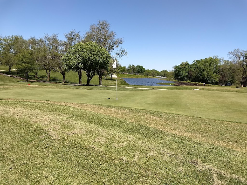 Panoramic view of a lush green golf course at Gardner Golf Course. Smooth