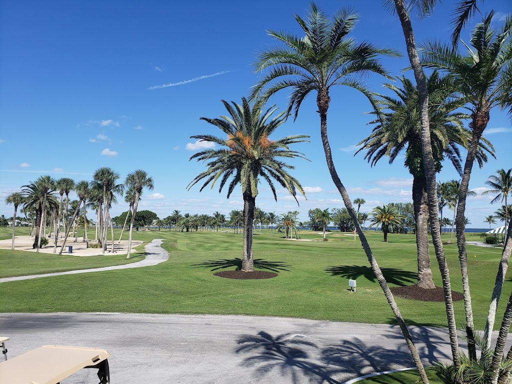 Panoramic view of a lush green golf course at Gasparilla Golf Club. Smooth