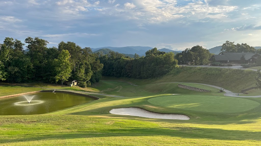 Panoramic view of a lush green golf course at Gatlinburg Golf Course. Smooth