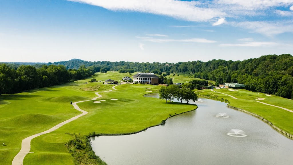 Panoramic view of a lush green golf course at Gaylord Springs Golf Links. Smooth