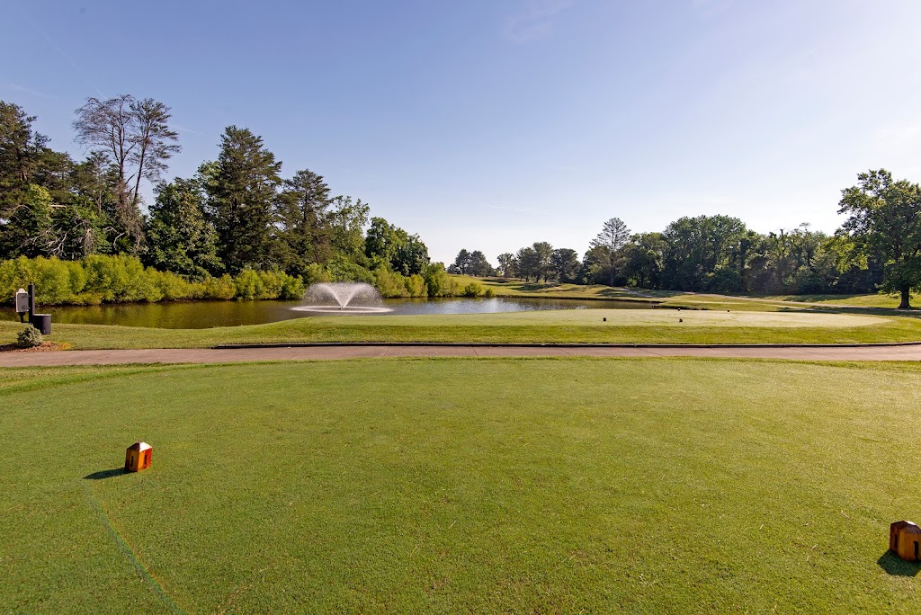 Panoramic view of a lush green golf course at General Burnside Island State Park. Smooth