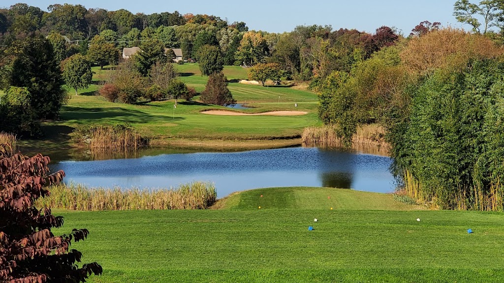 Panoramic view of a lush green golf course at Geneva Farm Golf Course. Smooth