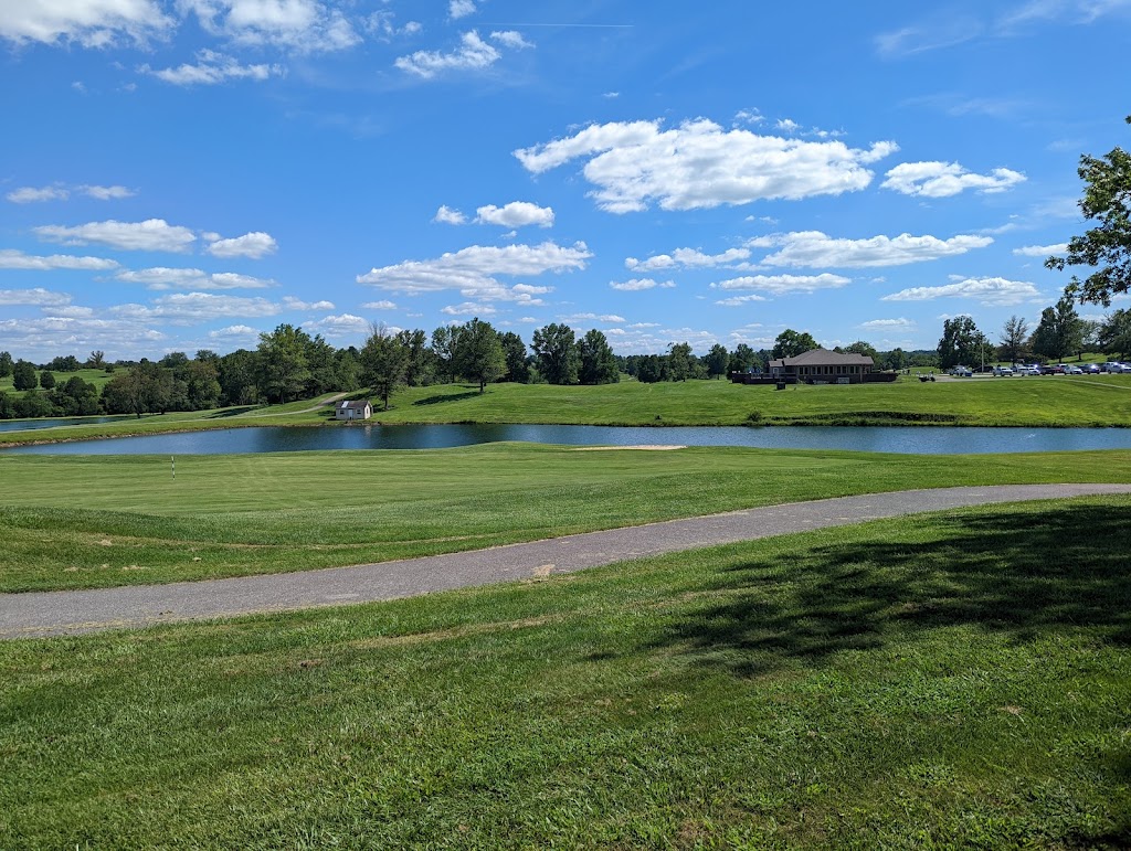 Panoramic view of a lush green golf course at Gibson Bay Golf Course. Smooth