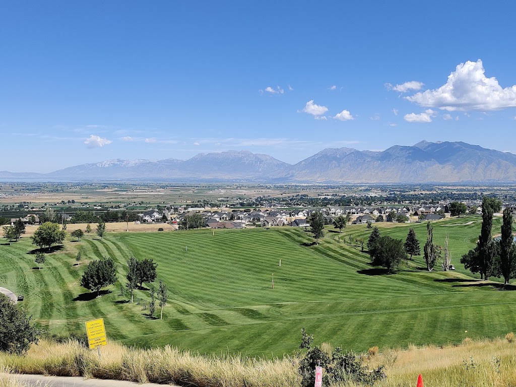 Panoramic view of a lush green golf course at Gladstan Golf Course. Smooth