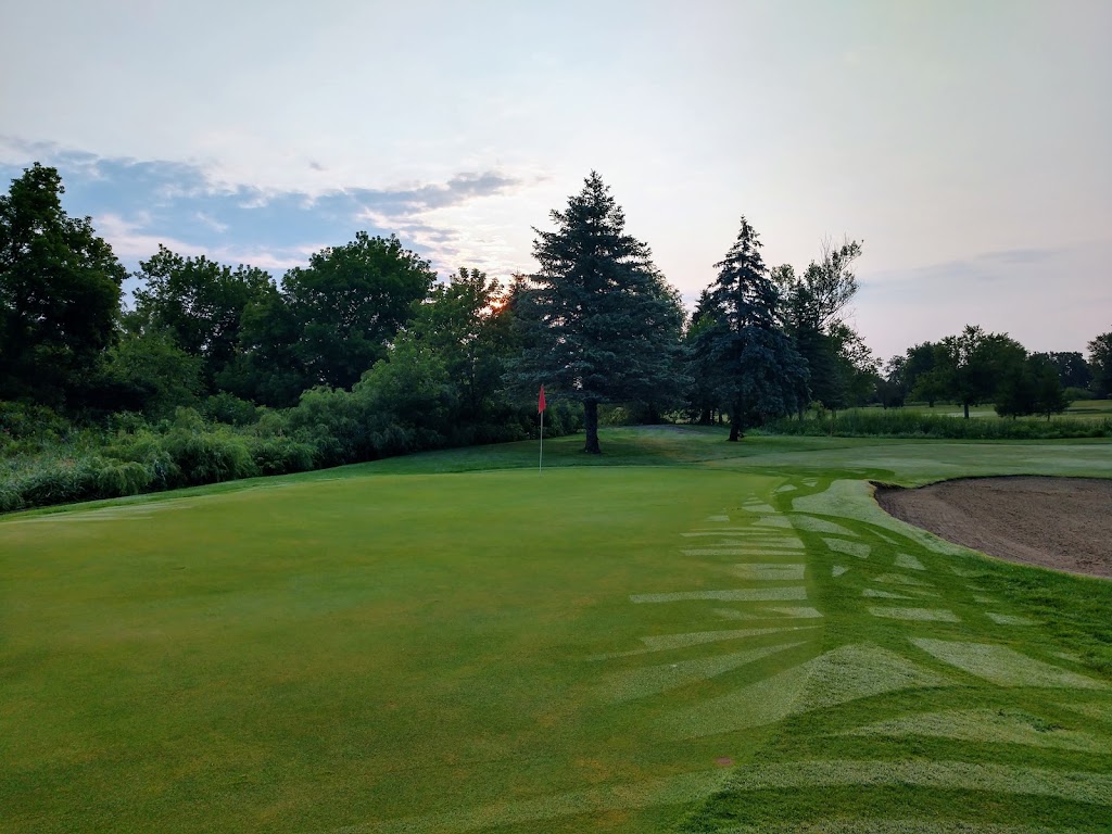 Panoramic view of a lush green golf course at Glenbrier Golf Course. Smooth