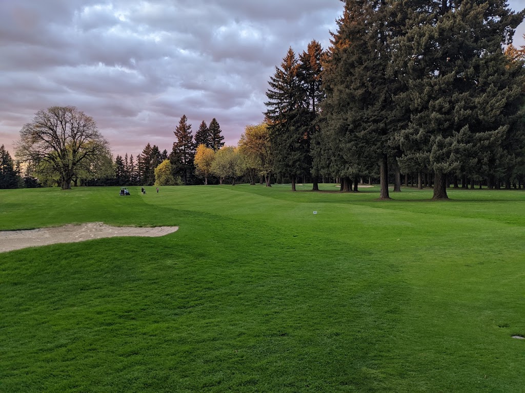 Panoramic view of a lush green golf course at Glendoveer Golf & Tennis. Smooth