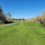 Panoramic view of a lush green golf course at Goose Creek Golf Club. Smooth