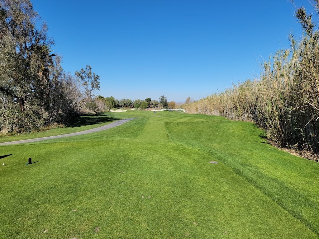 Panoramic view of a lush green golf course at Goose Creek Golf Club. Smooth