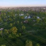 Panoramic view of a lush green golf course at Grand Canyon University Championship Golf Course. Smooth