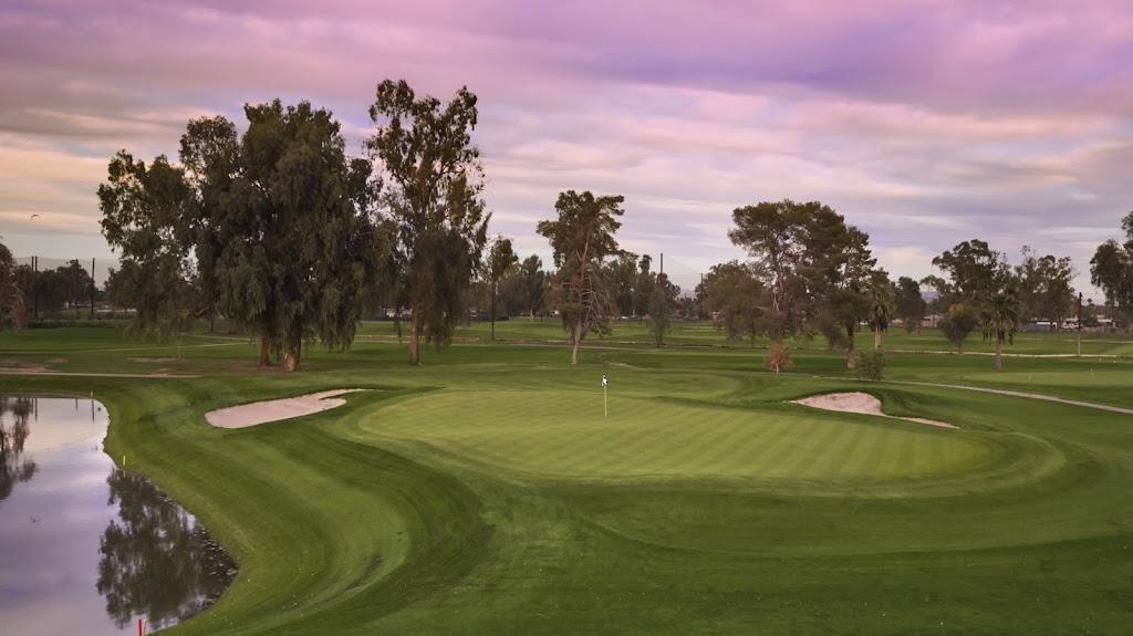 Panoramic view of a lush green golf course at Grand Canyon University Championship Golf Course. Smooth