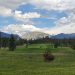 Panoramic view of a lush green golf course at Grand Lake Golf Course Grand Lake