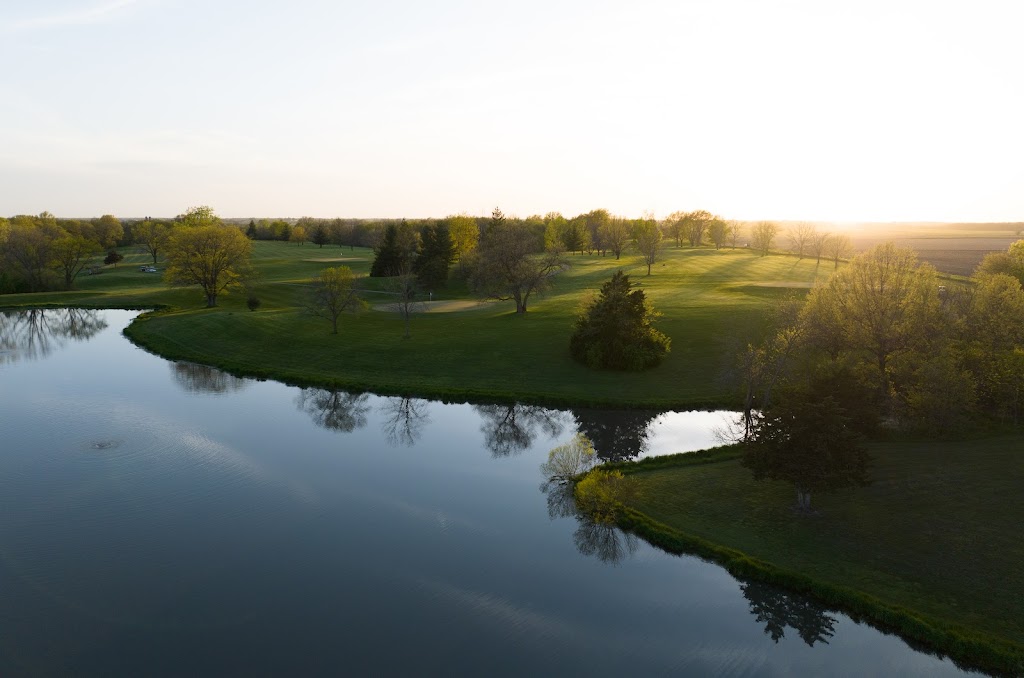 Panoramic view of a lush green golf course at Green Acres Golf Course and Restaurant. Smooth